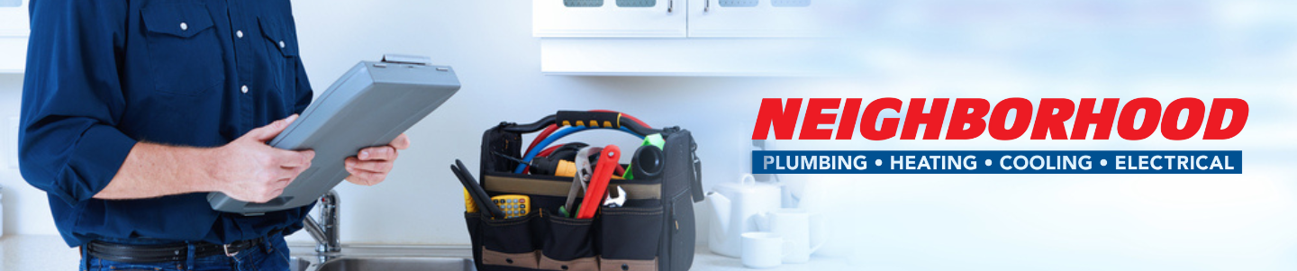 An HVAC contractor documenting a heating system and it reset button location. 